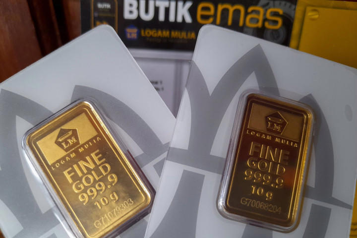Harga Emas Antam Hari Ini Turun Rp25.000, Kini Rp3.024.000 per Gram